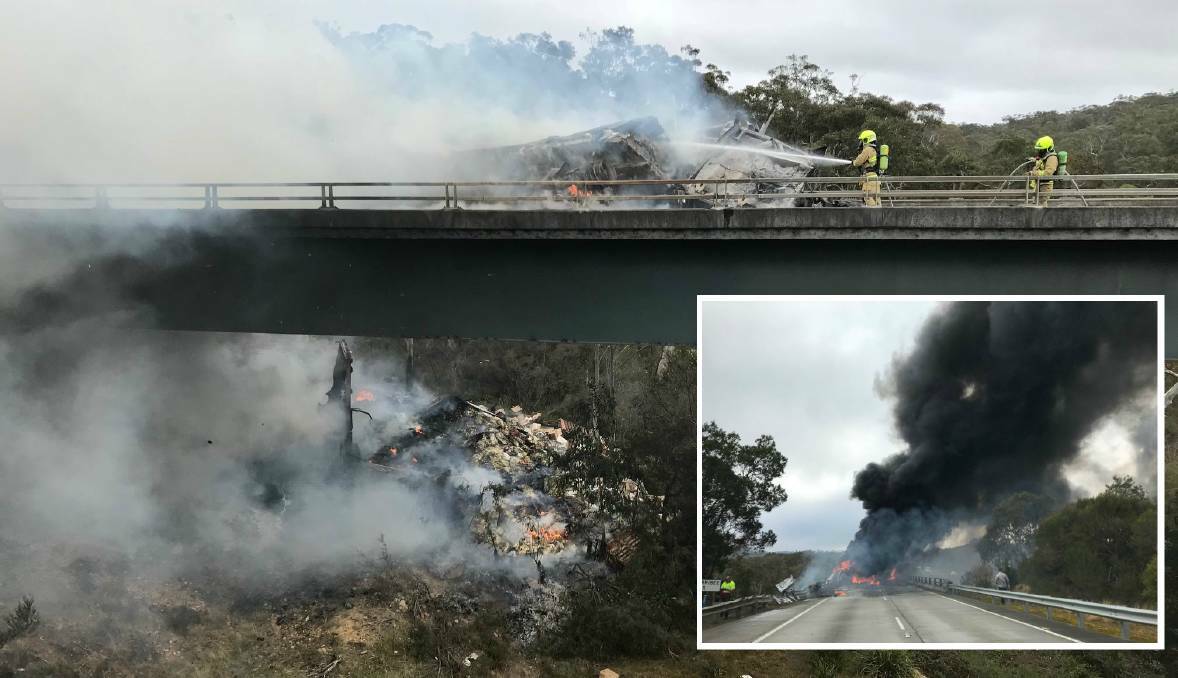 A prime mover and trailer goes up in flames in dramatic scenes at Berrima. Picture: NSW Rural Fire Service, Facebook