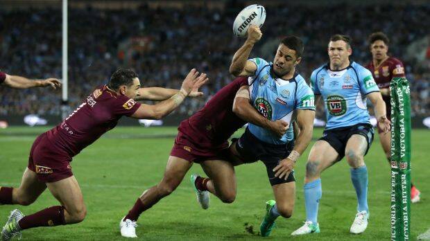 Bombed try: Jarryd Hayne is tackled by Will Chambers in a crucial moment at ANZ Stadium. Photo: Getty Images