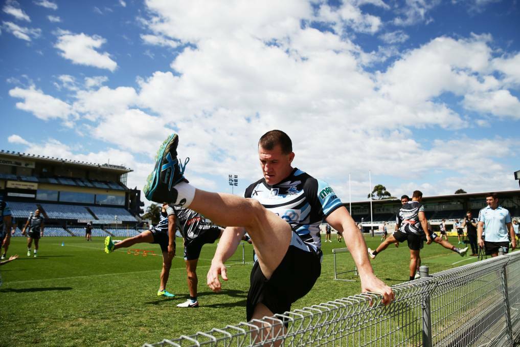 Sharks captain Paul Gallen warms up at training on Tuesday. Photo: Matt King/Getty Images
