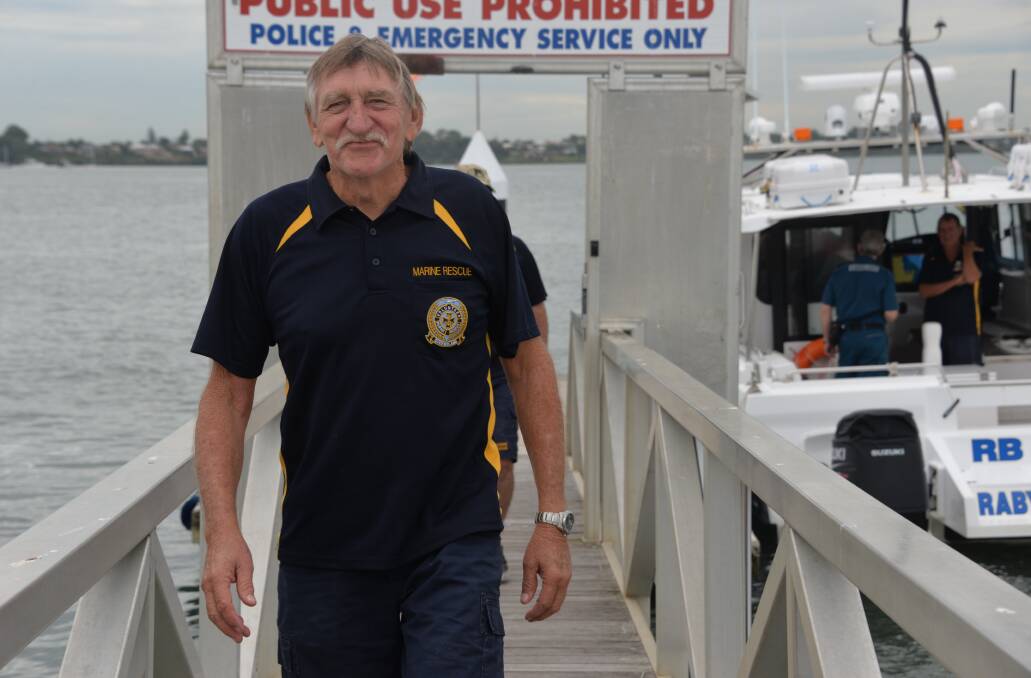 SAFE AND SOUND: VMR crewman Robert Cooper of Wellington Point leaves the rescue boat.