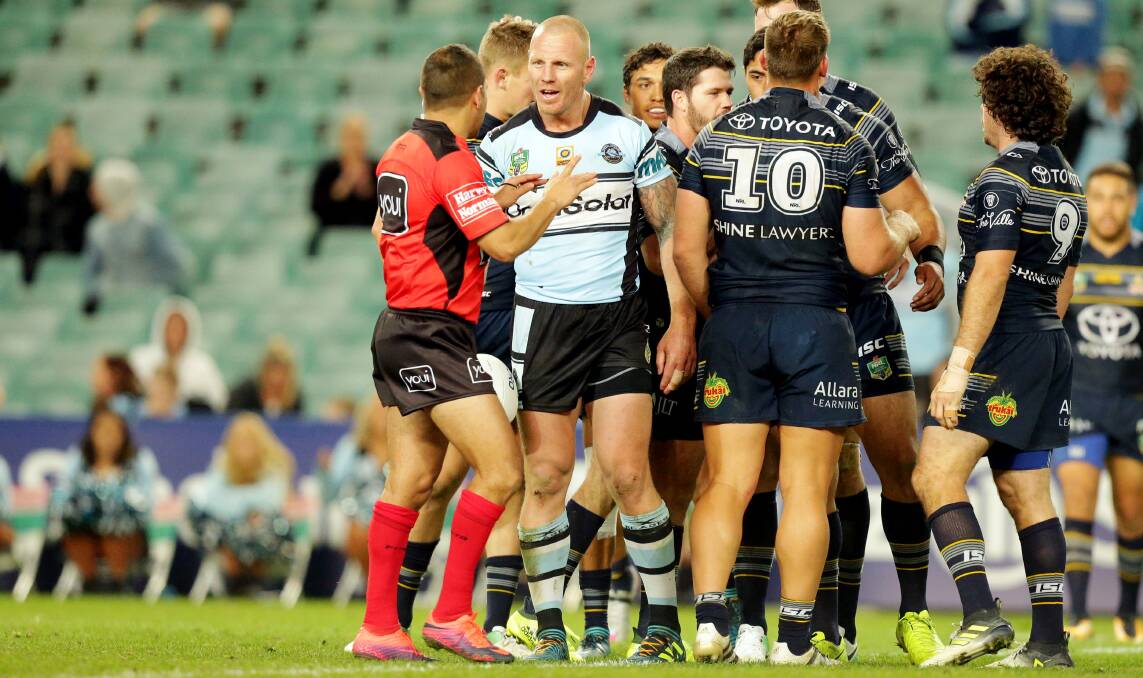 Tough calls: Sharks back-rower Luke Lewis remonstrates with referee Ashley Klein during extra-time of Cronulla's loss to the Cowboys. Picture: Chris Lane