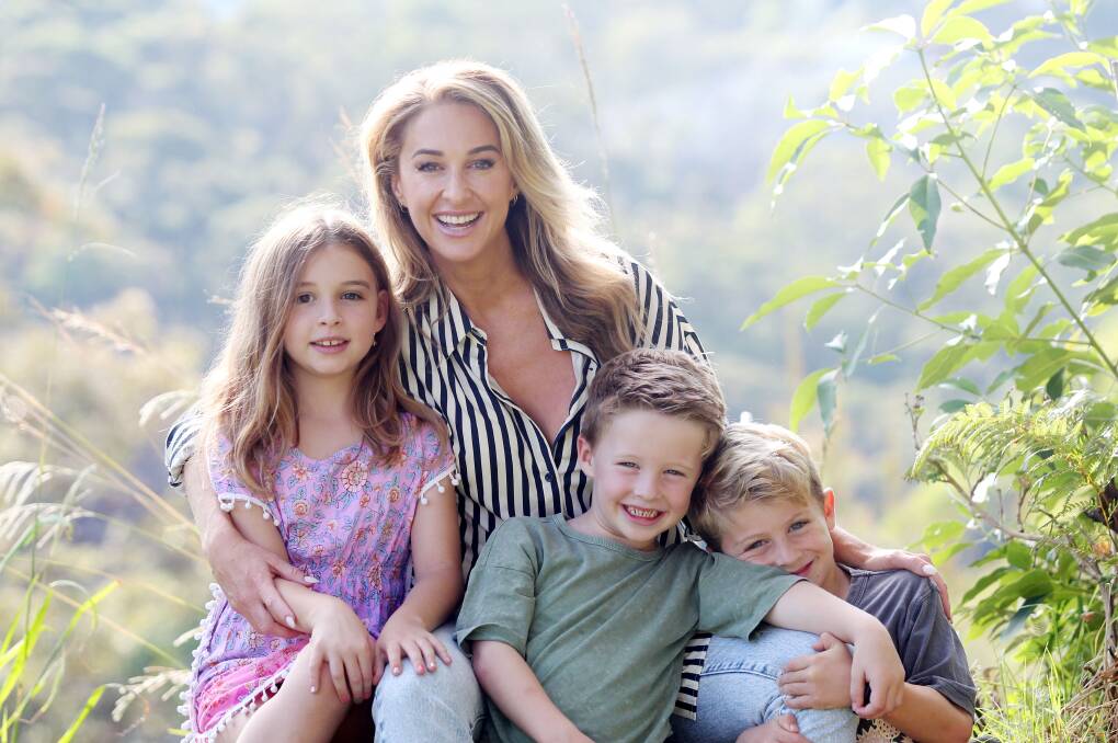 Amy Gerard with her children Charli, Bobby and Kobe. With a popular social media following, Amy, of Alfords Point, has written her first book. Picture by Chris Lane