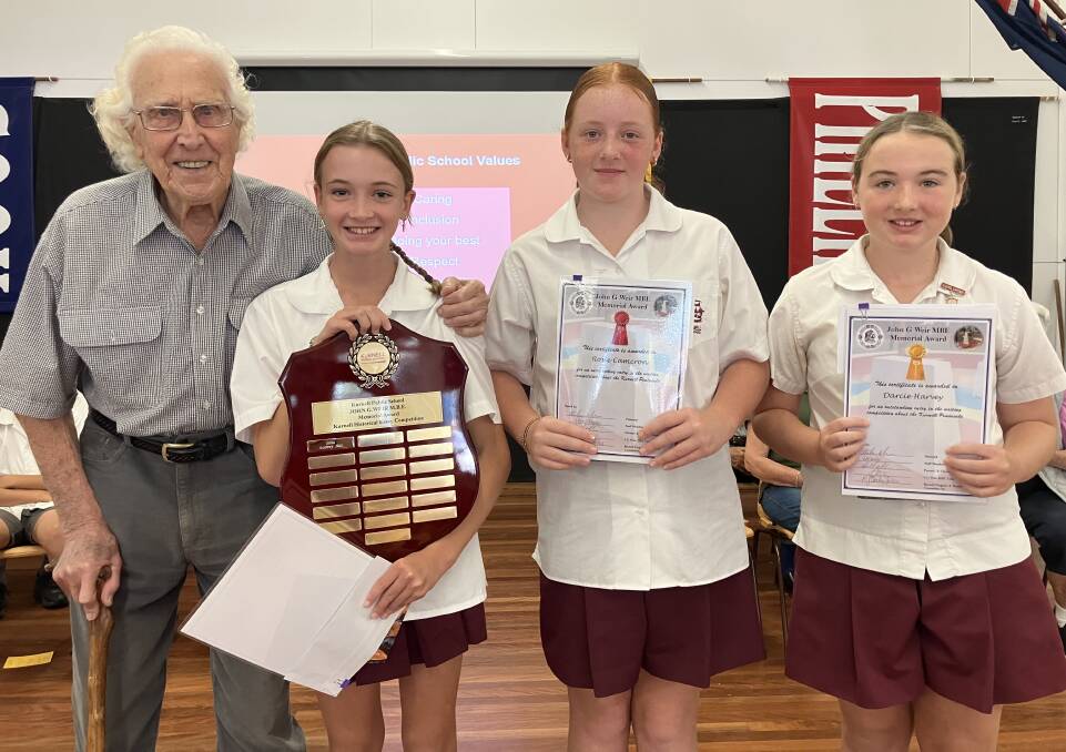 Nick Boes, 95, with the winning pupils from Kurnell Public School in the Kurnell History Prize 2024. First place winner was Audrey Hill, with Rosie Cameron (second place) and Darcie Harvey (third place). Picture supplied
