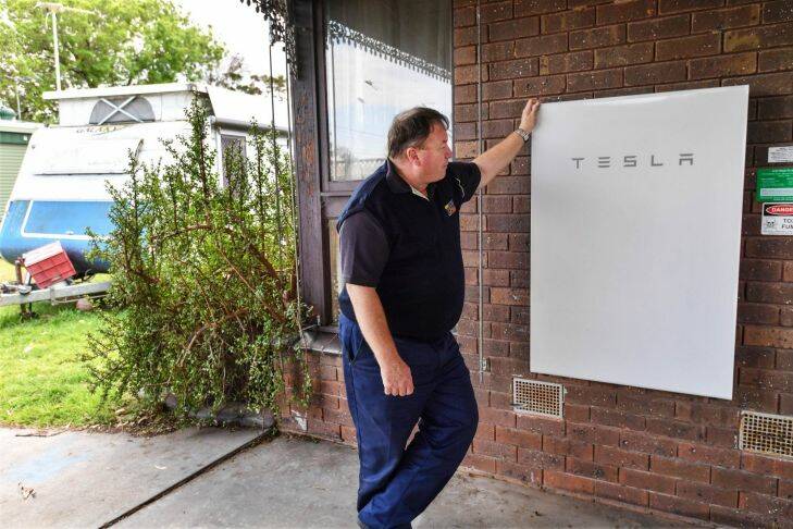 Andrew Mathrick with his solar plus battery home energy solution which includes the Tesla Powerwall 2. 21st September 2017. The Age Fairfaxmedia News Picture by JOE ARMAO