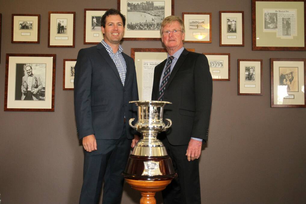 Next generation: Kel Nagle's grandson Jake Nagle and son Colin (both golf professionals) at the unveiling of the Kel Nagle Cup at Pymble Golf Club. Picture: Gene Ramirez