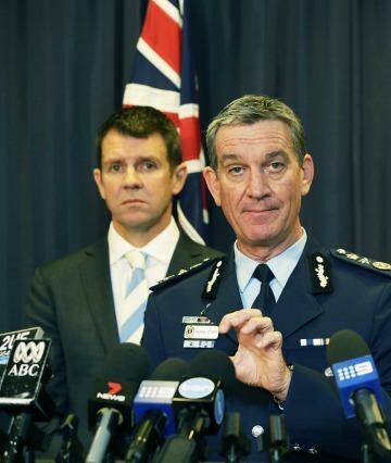 Resolute: Premier Mike Baird, NSW Police Commissioner Andrew Scipione and Police Minister Stuart Ayres addressing the media. Photo: Jessica Hromas