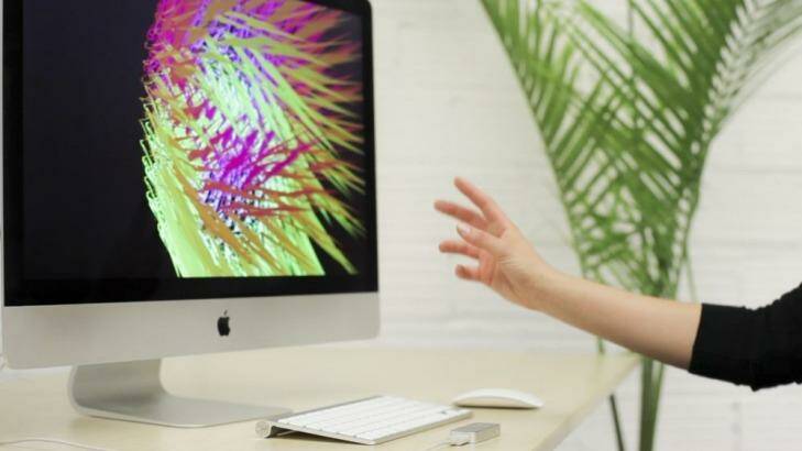 Swipe: A user controls an object on screen with Leap Motion.