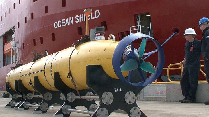 The autonomous underwater vehicle Bluefin 21 is prepared for loading on to the Ocean Shield. Photo: Amanda Hoh