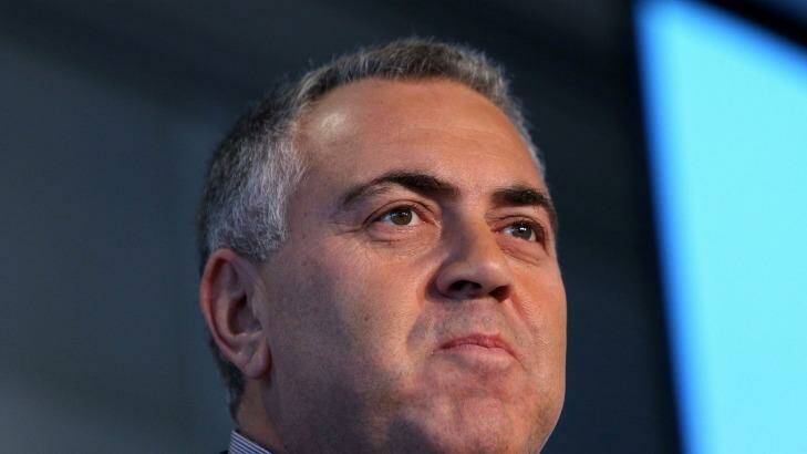 Wishful thinking?: Treasurer Joe Hockey is determined to get more tax out of multinationals engaged in profit-sharing.  Photo: Graham Denholm