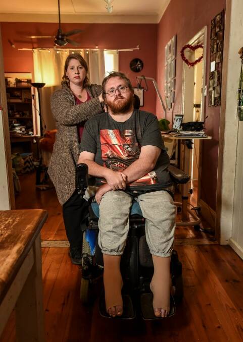The Age, News, 14/02/2017, picture by Justin McManus. Shane Barnbrook with wife Sarah. They are suing two hospitals for negligent care that left him a paraplegic. Photo: Justin McManus