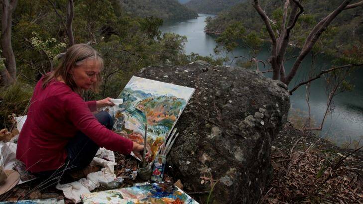 Celia Perceval paints near Bobbin Head. Photo: Dean Sewell
