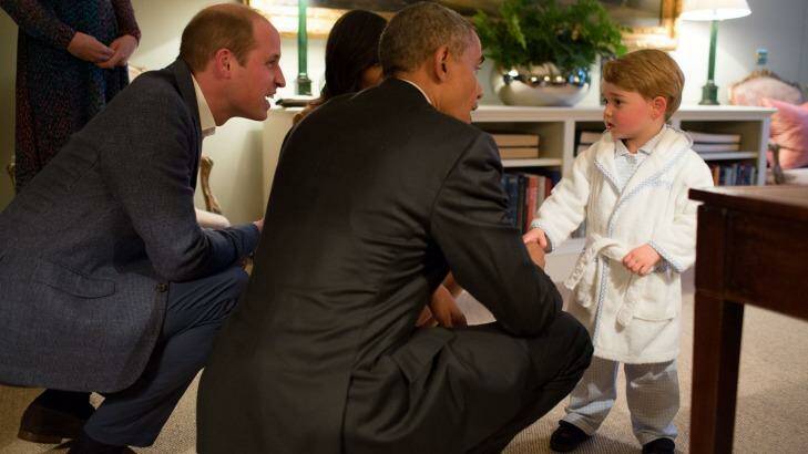 Prince George shakes hands with Prince George at Kensington Palace. Photo: Pete Souza/The White House