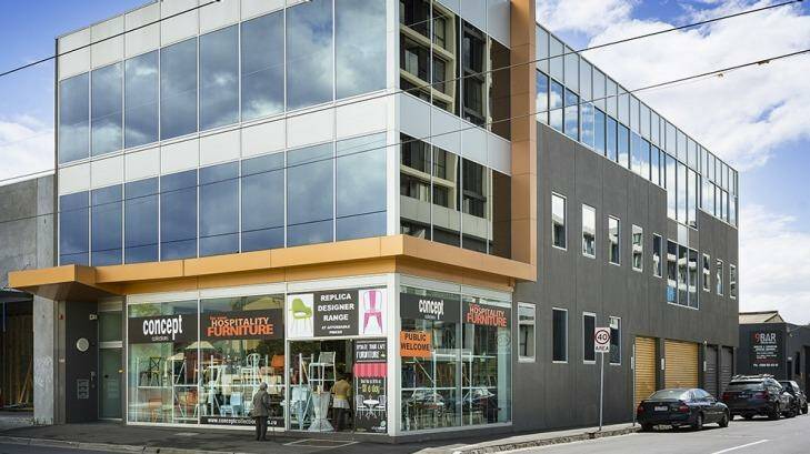 A multi-tenanted three-level corner building in Abbotsford has sold privately for $4.2 million.  Photo: Supplied
