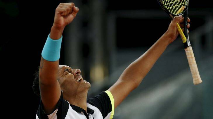 Kyrgios celebrates his victory over Federer at the Madrid Open Photo: Susana Vera