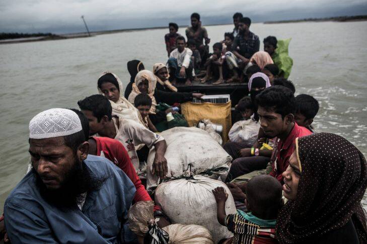 Rohingya refugees arrive by boat from Myanmar, near Teknaf, Bangladesh, 28 September 2017. Thousands of Rohingya continued to flee to Bangladesh in late September and early October, describing the burning of their villages as well as starvation caused by the Myanmar military's severe restrictions on their movement and on humanitarian assistance.Copyright Credit:?? 