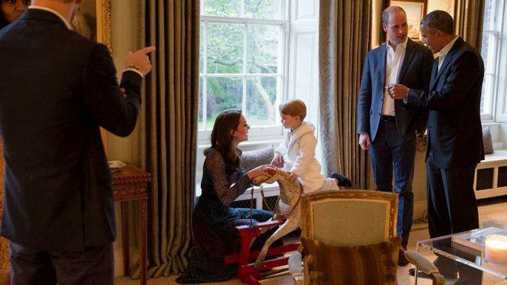 Prince George plays on the rocking horse previously given by the Obamas. Photo: Pete Souza/The White House