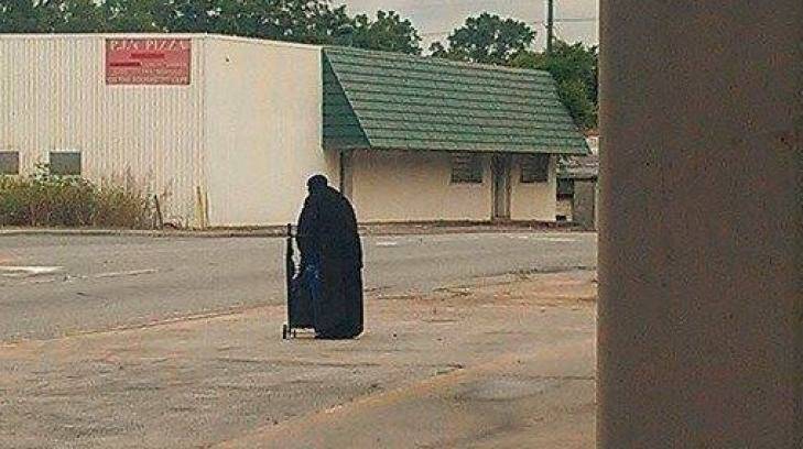 The woman in black in West Virginia. Photo: Facebook