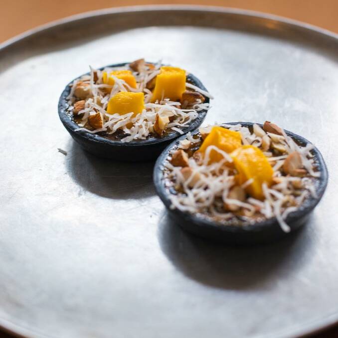 Black sticky rice mango pudding tart with mint and lime-infused custard, almond and coconut. Photo: Sarin Rojanametin