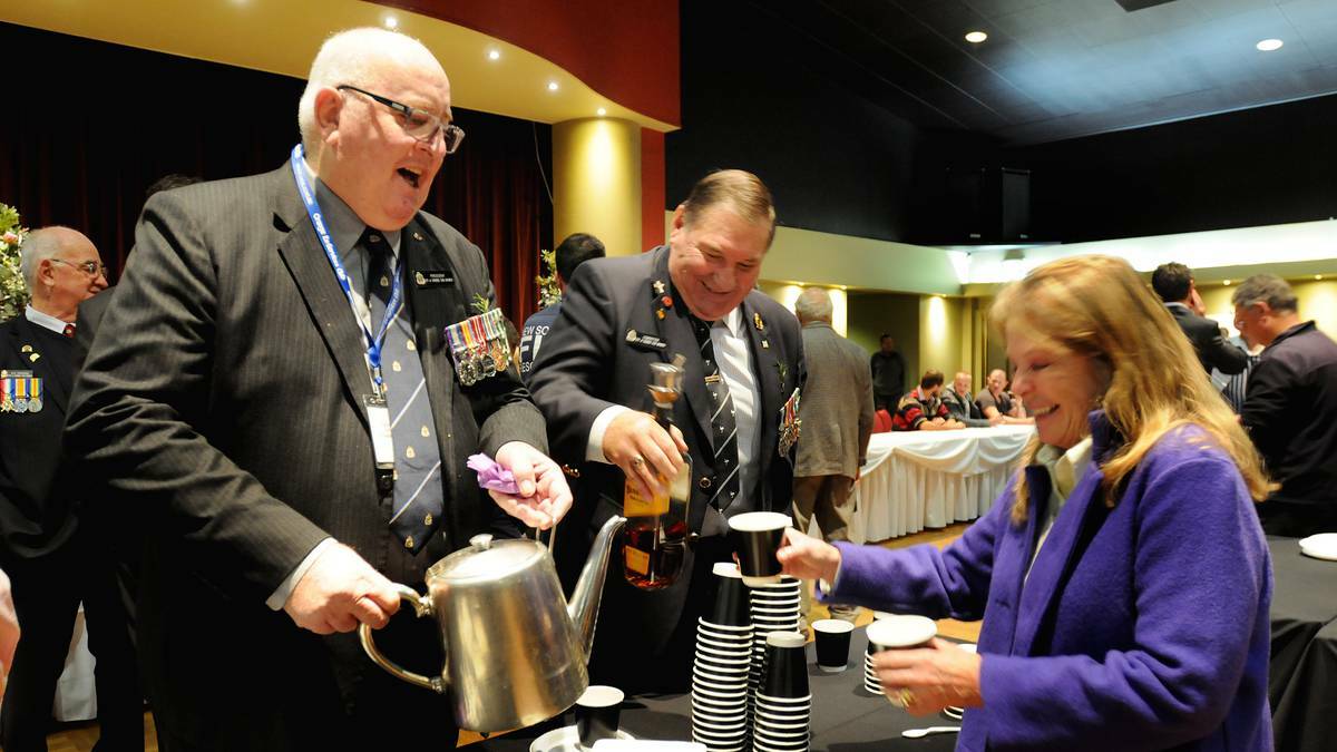 ORANGE: Lindsay Wright, Graeme Scott and Cindy Tudor at the Anzac Day breakfast. Photo: Steve Gosch, Central Western Daily. 