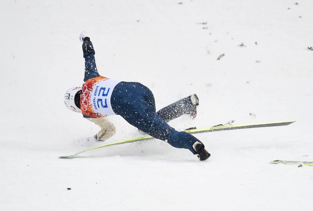 Taihei Kato of Japan crashes as he competes in the Nordic Combined Men's Individual LH during day 11 of the Sochi 2014 Winter Olympics at RusSki Gorki Jumping Center on February 18, 2014 in Sochi, Russia. Photo: GETTY IMAGES