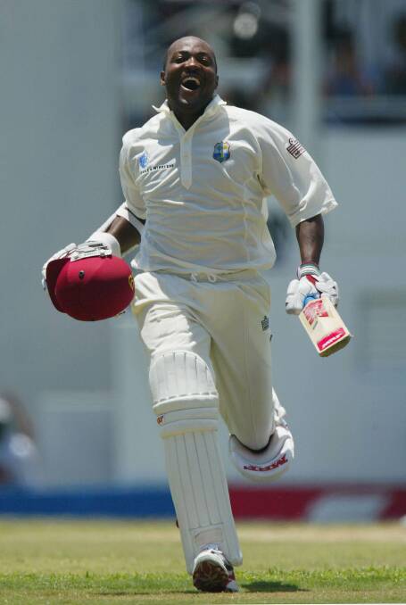 Destiny: Brian Lara celebrates after claiming his record back against England in 2004. Picture: Getty Images 