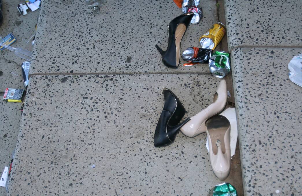 Discarded shoes at the 2013 Melbourne Cup. PHOTO: Fairfax Digital Collection.