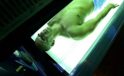 Wake up call ... Jeff Davenport visits a solarium about once a week. He says a ban could drive people to other methods such as artificial tanning drugs.