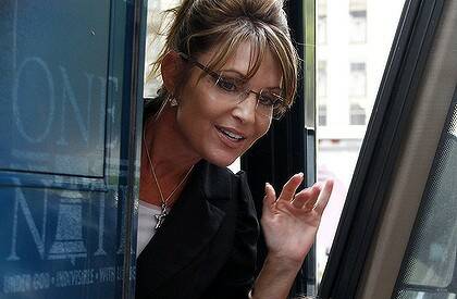 Sarah Palin boards her One Nation Tour bus after a visit to the Fox News headquarters in New York on June . Palin is on a tour of historical sites of the US.