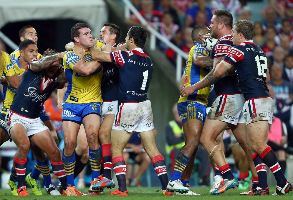 SYDNEY, AUSTRALIA - MARCH 15: A fight breaks out between Jared Waerea Hargreaves of the Roosters and Darcy Lussick of the Eels during the round two NRL match between the Sydney Roosters and the Parramatta Eels at Allianz Stadium on March 15, 2014 in Sydney, Australia. (Photo by Renee McKay/Getty Images)
